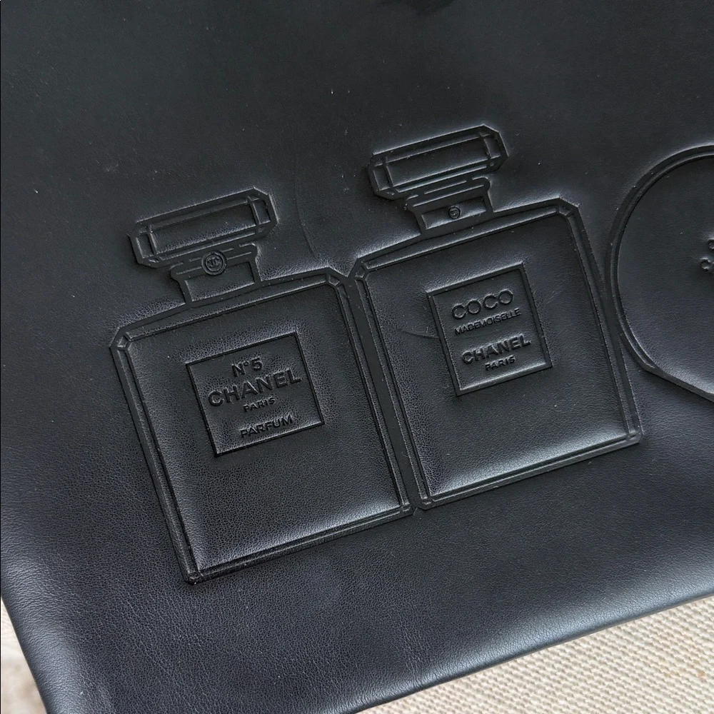 CHANEL Embossed Leather Toiletry Pouch